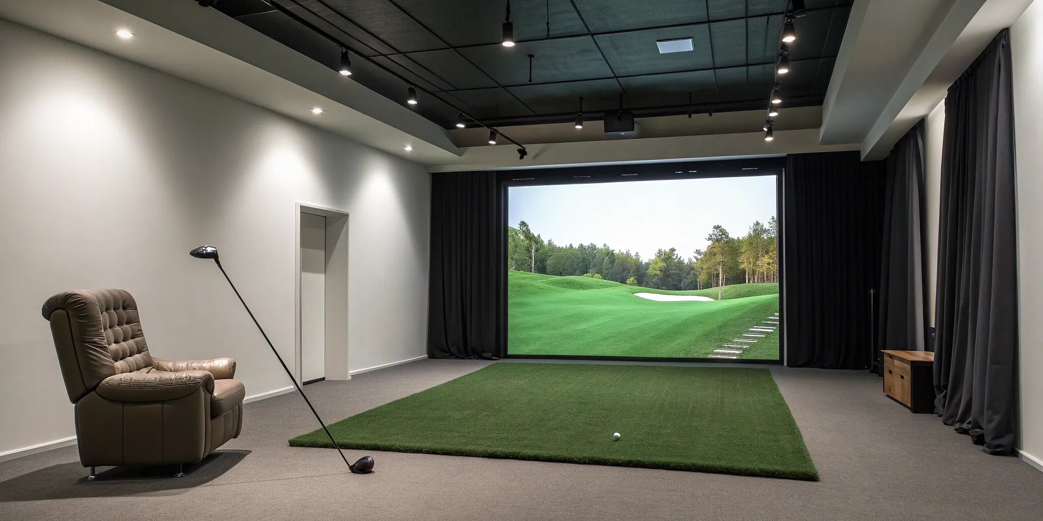 Spacious golf simulator room with a large screen, designed for proper metric dimensions.