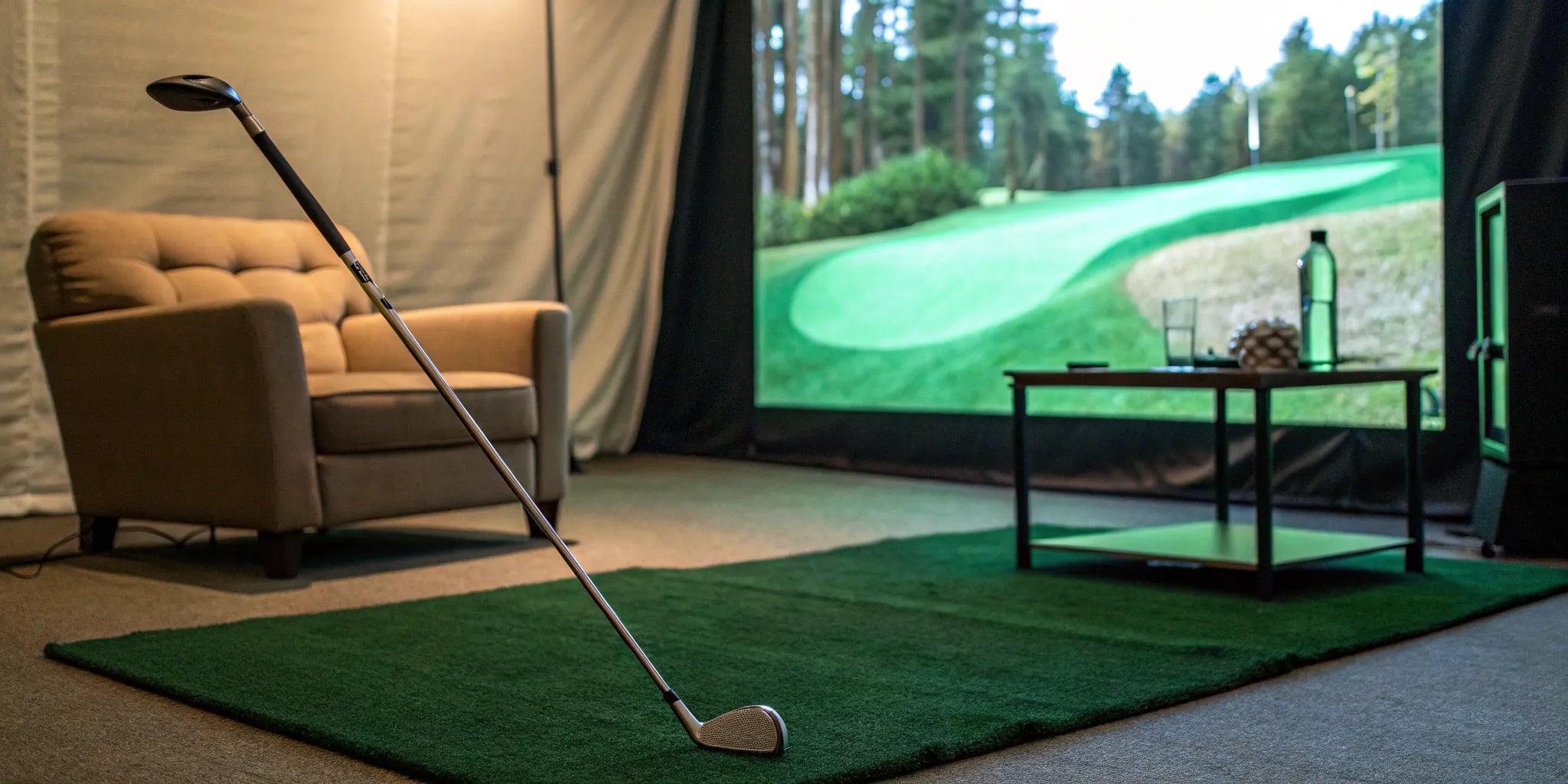 A golf simulator enclosure kit with an impact screen set up for indoor home practice.